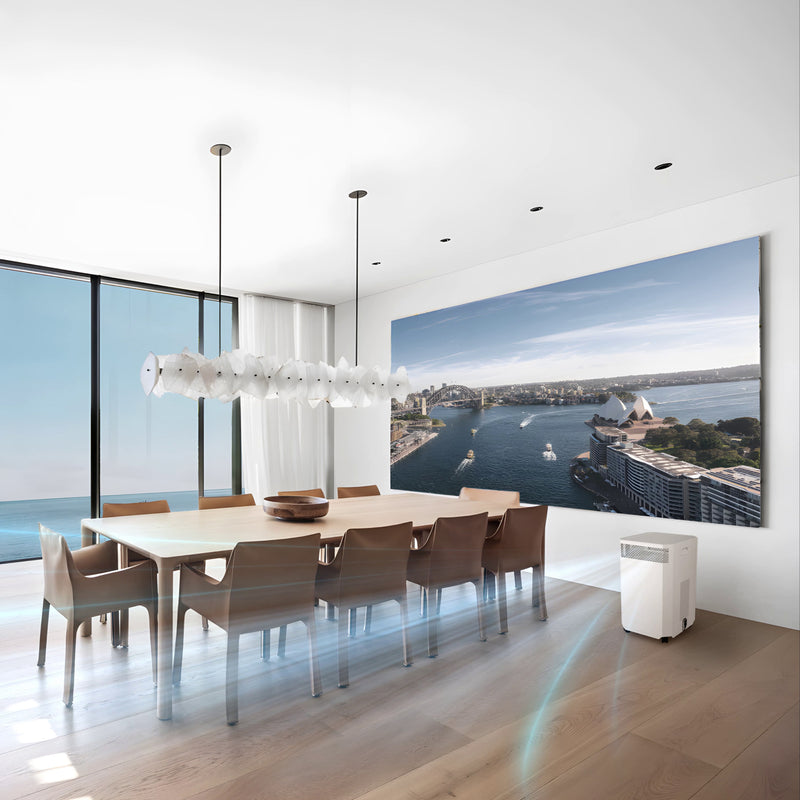 Load image into Gallery viewer, A modern dining room with an INOVA air purifier, quietly cleaning the air, removing odours, allergens and dust.