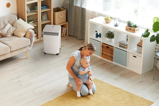 Mother with children enjoying clean air from an INOVA air purifier.