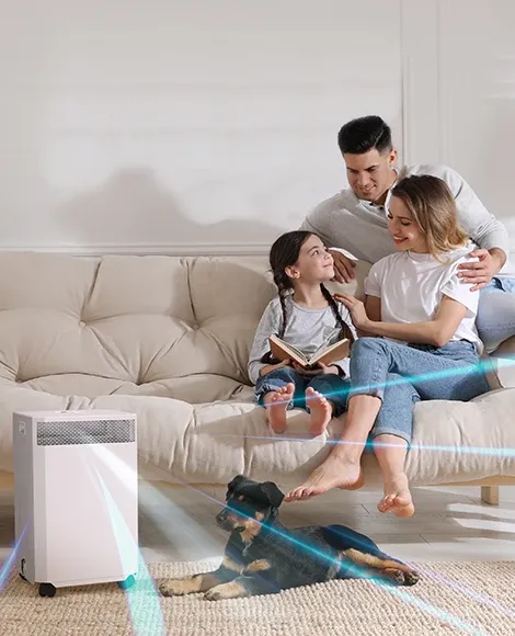 Family with a dog enjoying an INOVA DE20 Air Purifier in their home.