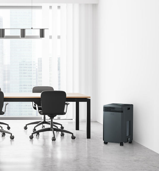 black inova de20 air purifier in office space